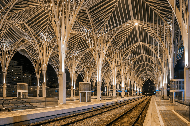 The steel tree-like canopy of Lisbon's Oriente station at night in the Winter