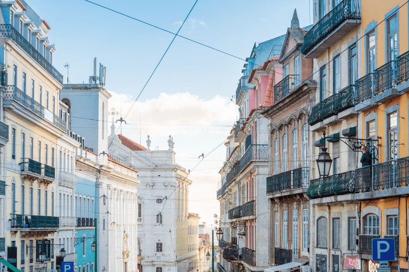 A view through one of Lisbon's colourful historic streets on a sunny day in Winter