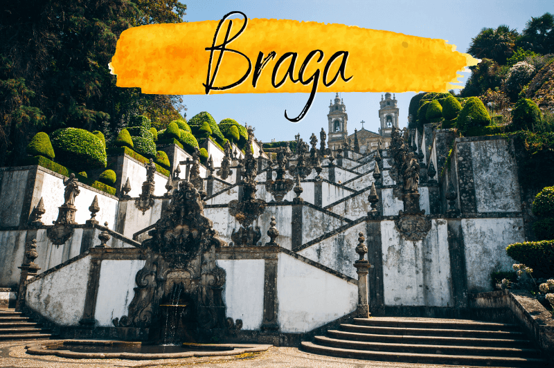The whitewashed walls of an intricate outdoor staircase in Braga