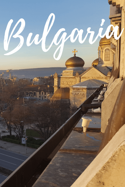Varna Bulgaria rooftops at Sunrise with the text "Bulgaria" written over the photo in Handwriting