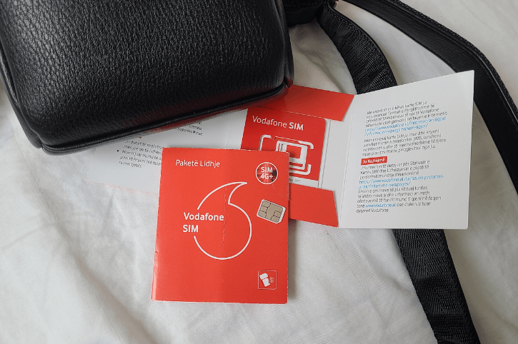 Two Vodafone sim cards with packaging