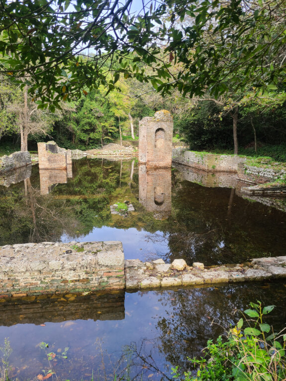 Remains of a pagan shrine that was transformed into a church with flooded grounds in the front