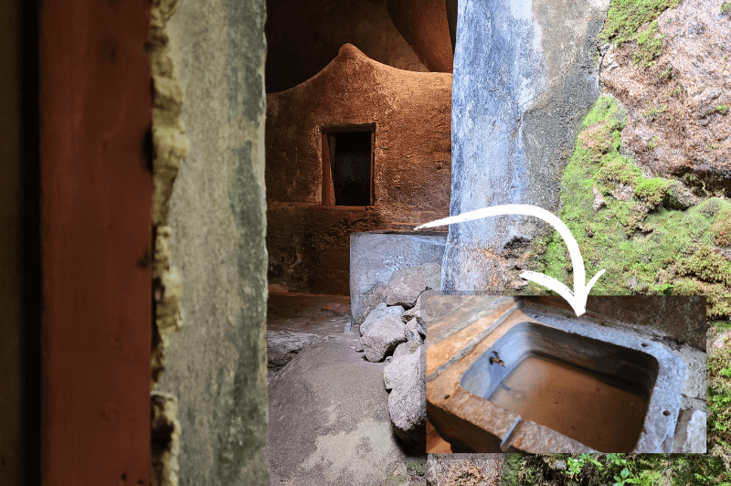 The washroom at Convent of the Capuchos, where the bathtub still naturally fills with water.